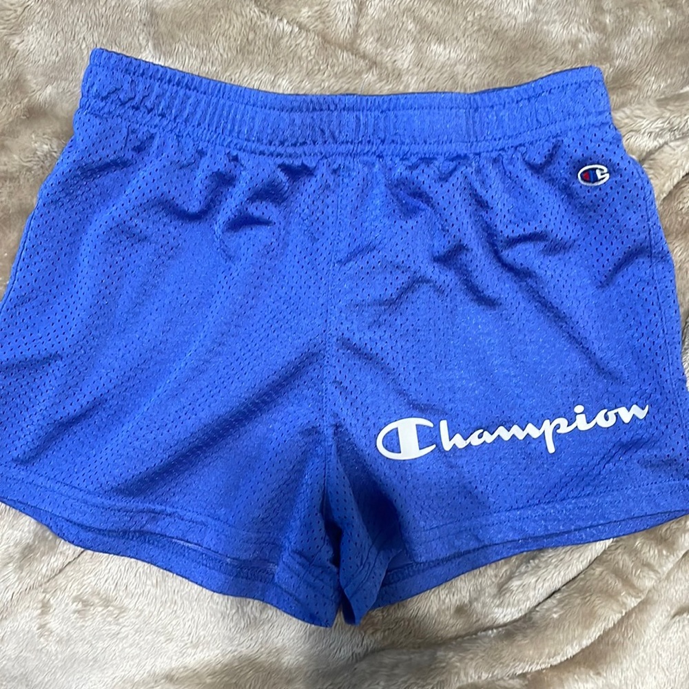 Blue basketball style shorts, size large in kids athletic wear from champion